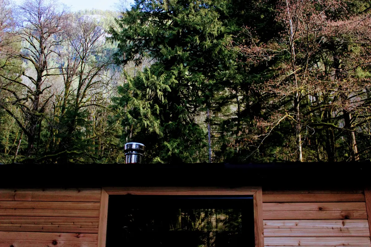 Secret Sauna Company mobile sauna among the trees in British Columbia