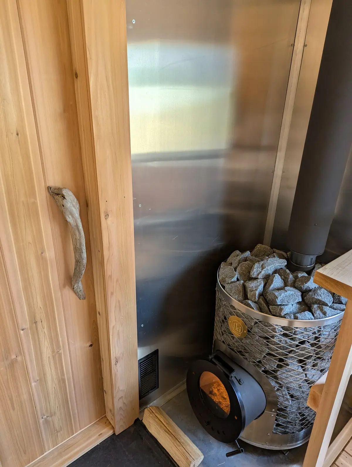 Commercial sauna interior with professional-grade cedar benching